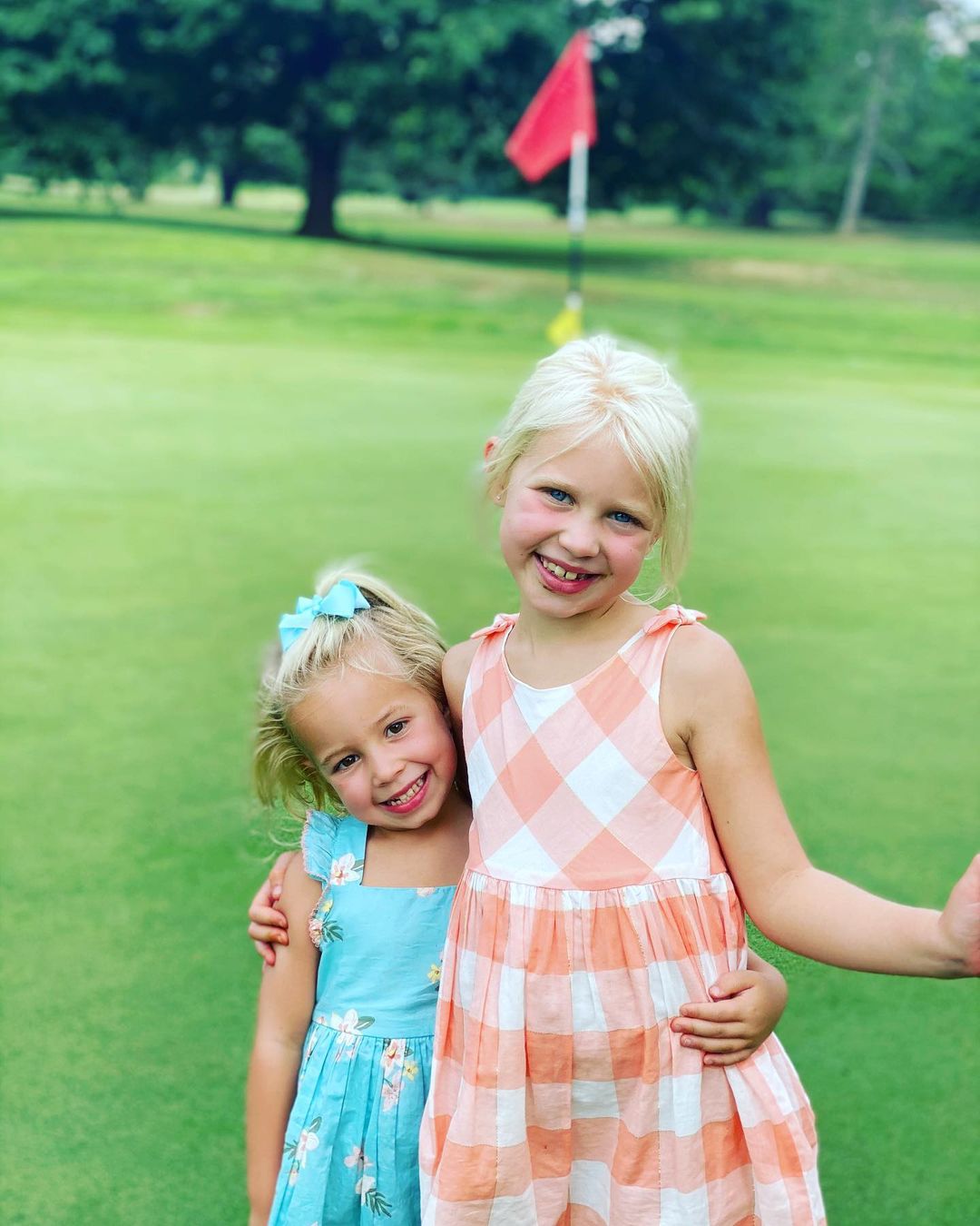 Finley with her golfing buddy and sister Blake Briscoe in 2020